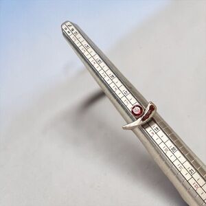 Elegant Silver Ring with Red Gemstone